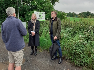 Chris Clarkson MP for Heywood and Middleton and Conservative Greater Manchester Mayoral Candidate, Laura Evans speak to a lead campaigner from the Save our Slattocks Greenbelt Group